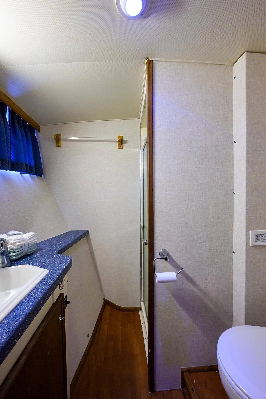 Clean head with shower aboard the Carolina Blonde