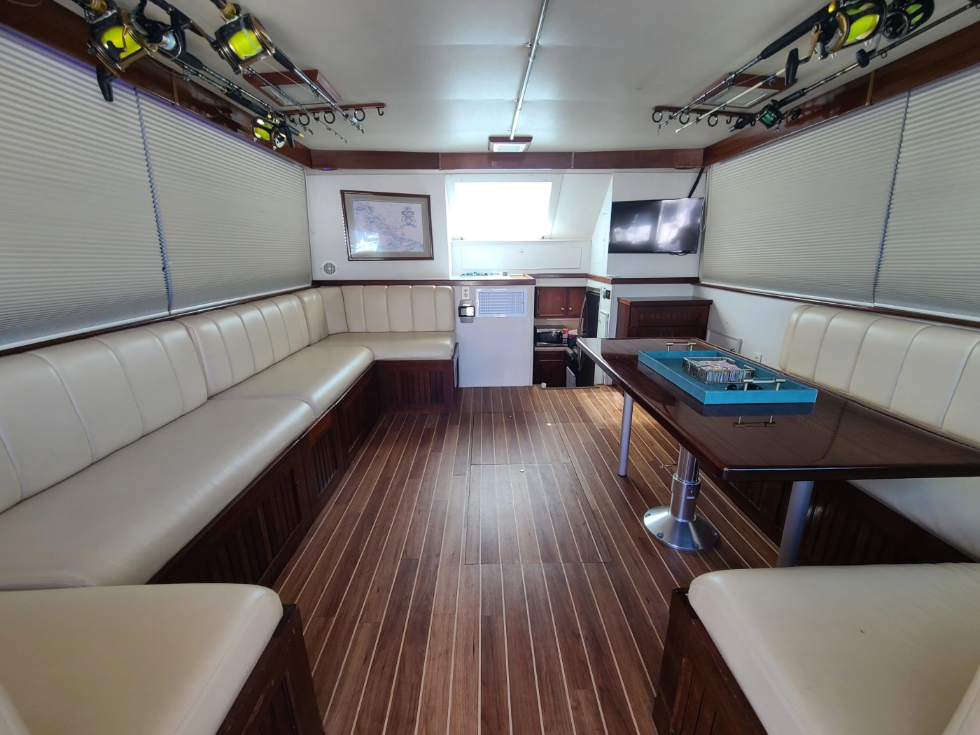 Air-conditioned teak salon with seating